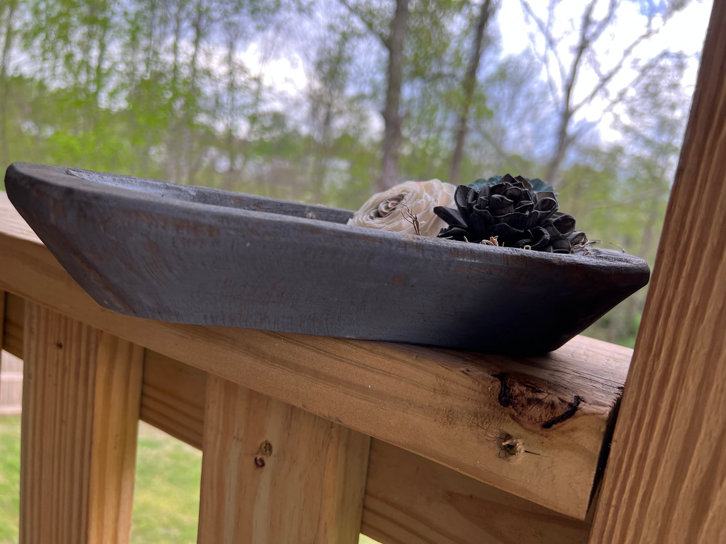 SMALL WEATHERED GREY WOODEN DOUGH BOWL EMBELLISHED WITH MOSS AND WOODEN FLOWERS