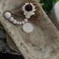 WHITE DISTRESSED WOODEN PRAYER BOWL WITH DISTRESSED BEADED TASSEL