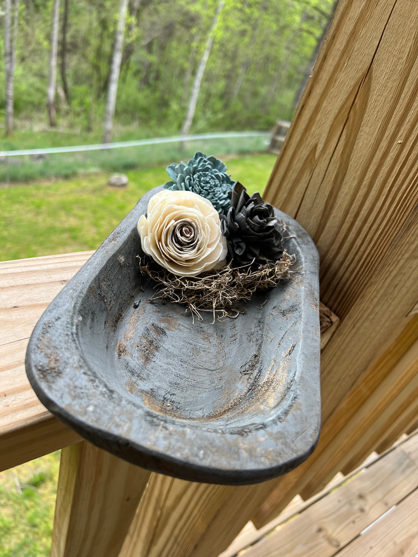 SMALL WEATHERED GREY WOODEN DOUGH BOWL EMBELLISHED WITH MOSS AND WOODEN FLOWERS