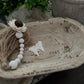 WHITE DISTRESSED WOODEN PRAYER BOWL WITH DISTRESSED BEADED TASSEL