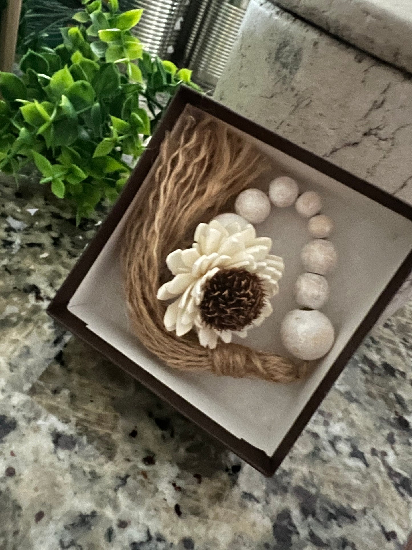 WOODEN BEADED WHITEWASHED TASSEL WITH WOODEN FLOWER EMBELLISHMENT